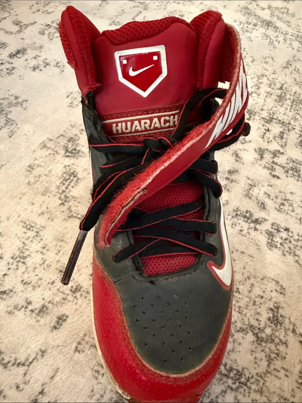 Nike Kids Red and Black High-Top baseball shoes